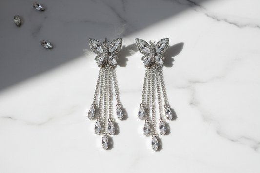 Butterfly Tassel Drop Earrings flat lay