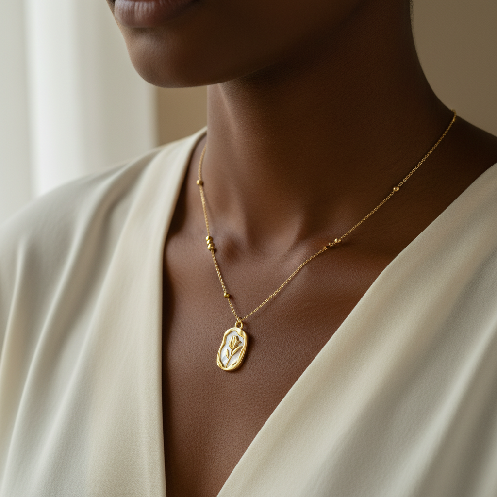 Close-up of Rose Shell mother of pearl necklace on collarbone